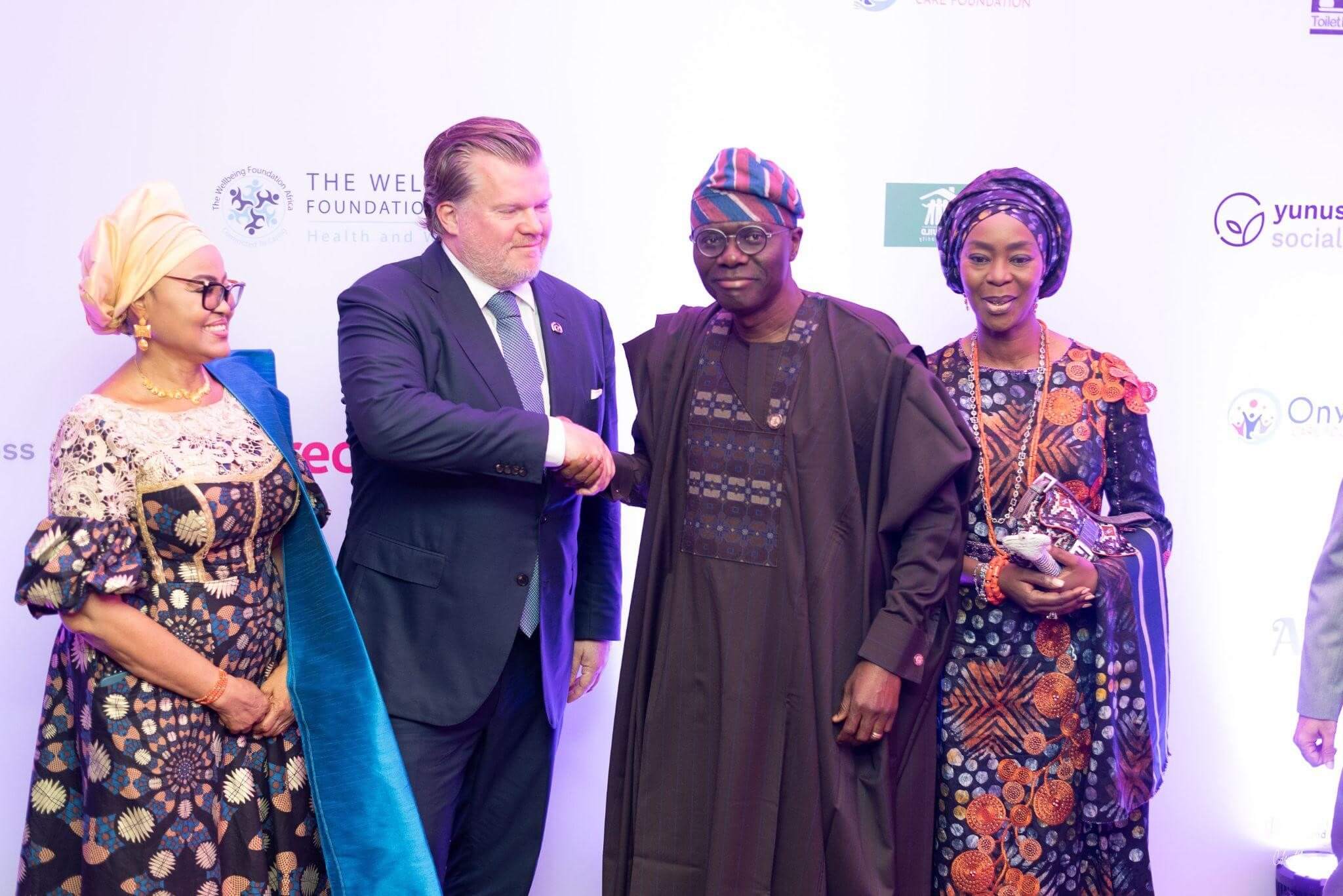 Governor of Lagos state, Sanwo 0lu posing with Tosin Saraki and Reckitt Stakeholders